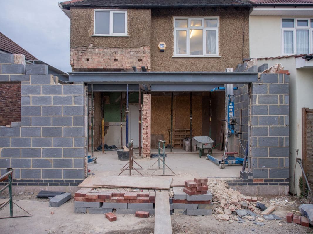 Garage exterior being converted into a living space